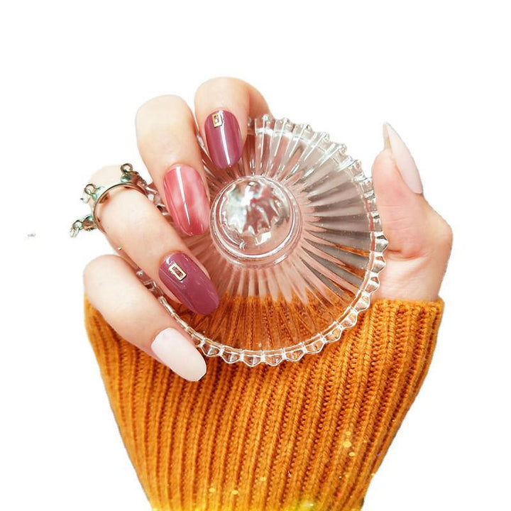 Glamouröse Kunstnägel mit Glitzer- und Strassverzierungen Karnz
