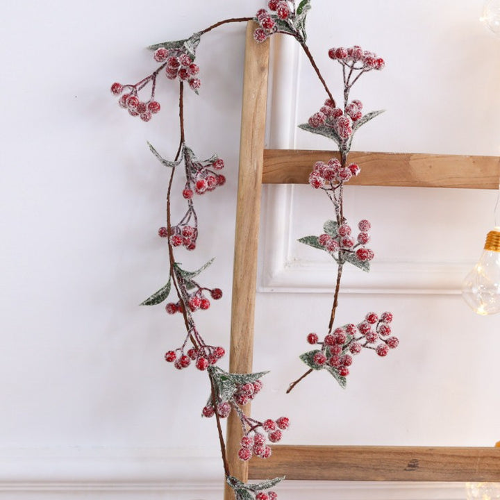 Weihnachtskranz mit roten Beeren