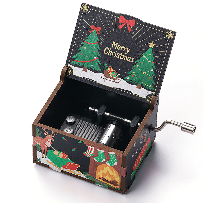 Holz-Spieluhr mit Weihnachtsmotiven, handbetrieben