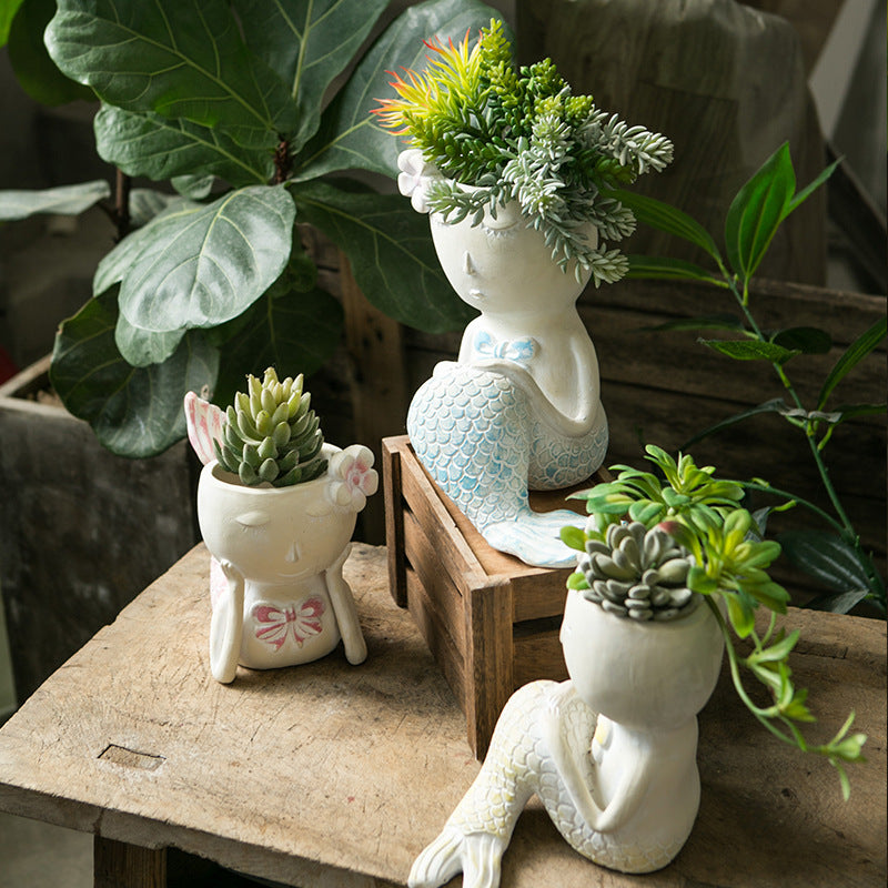 Künstlerische Blumengefäße Karnz