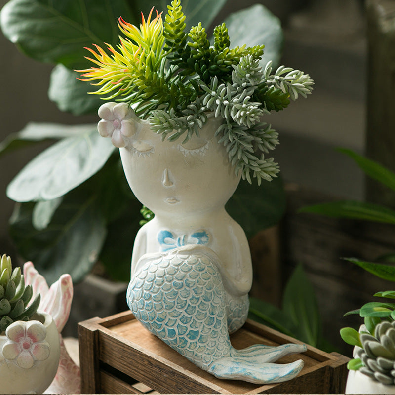 Künstlerische Blumengefäße Karnz