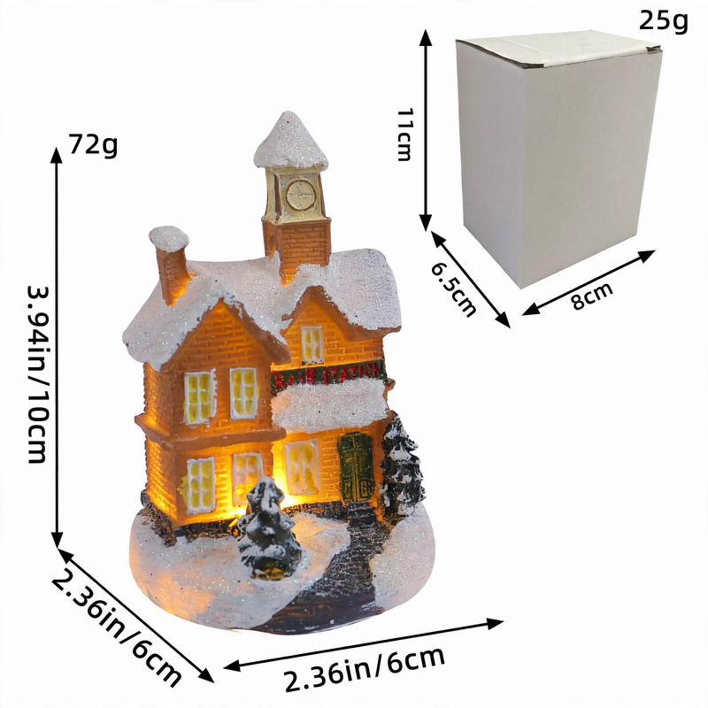Beleuchtetes Miniatur-Weihnachtshaus mit Schneelandschaft