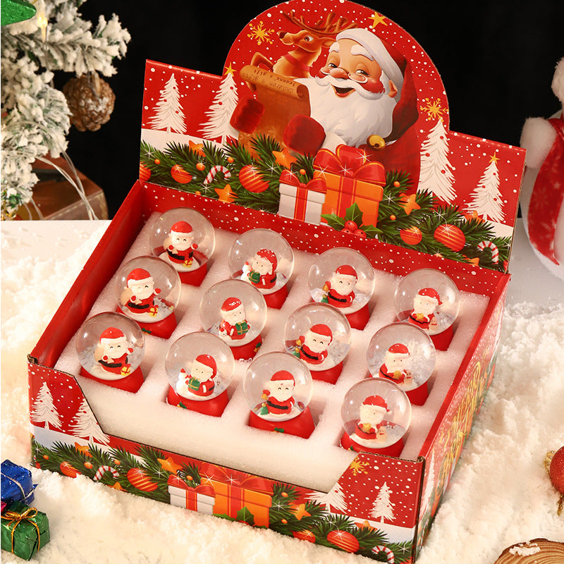 Leuchtende Weihnachts-Schneekugel mit Figuren