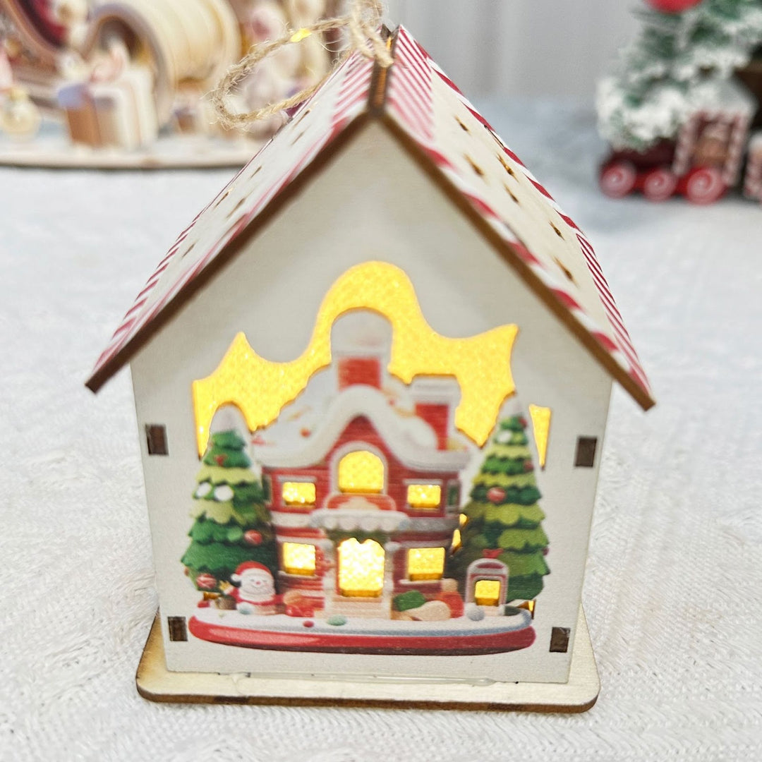 Beleuchtetes Weihnachts-Holzhaus im skandinavischen Stil