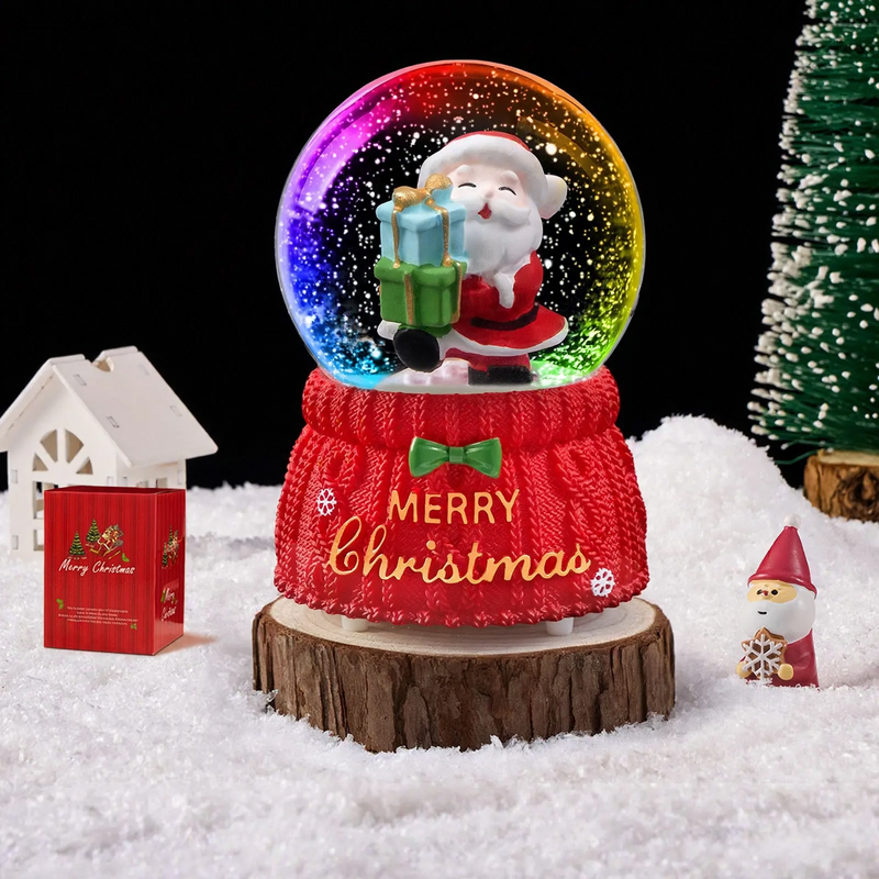 Weihnachtliche Schneekugel mit Spieluhr und Kutschen-Design