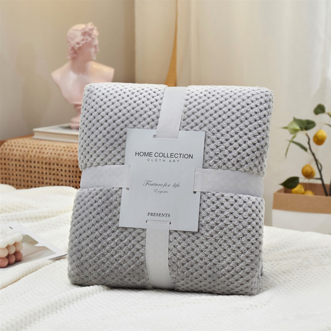 Flauschige Flanell-Decke mit Waffelstruktur
