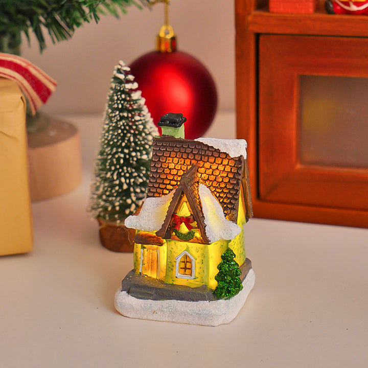 Beleuchtetes Weihnachts-Häuschen aus Kunstharz