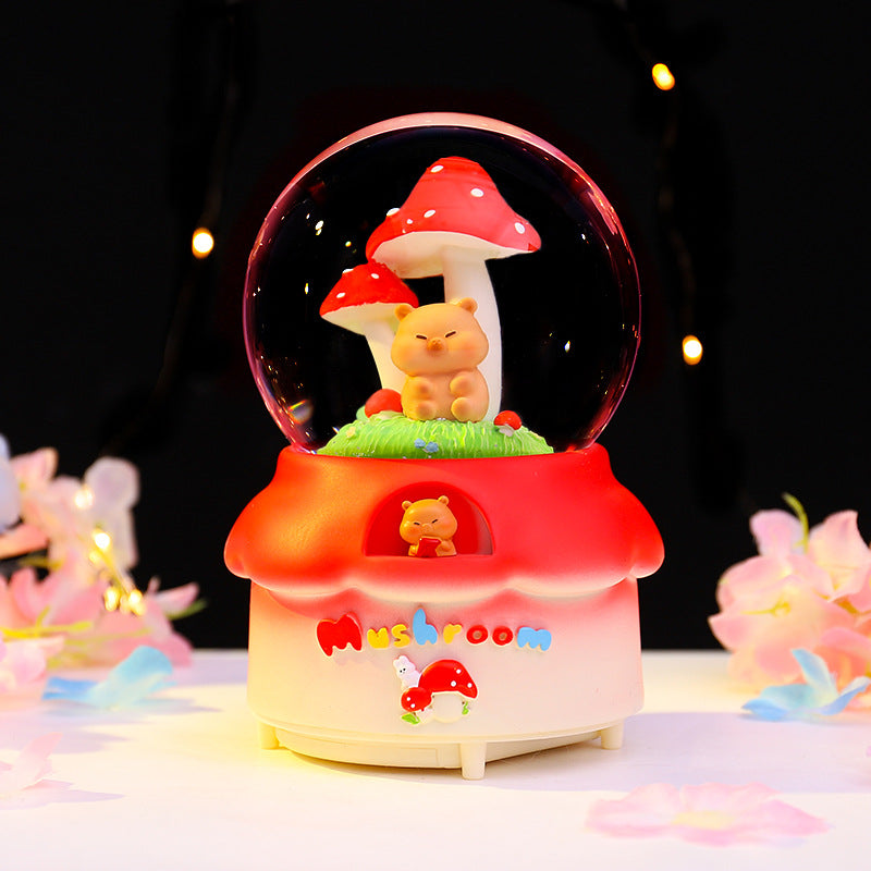 Märchenhafte Schneekugel mit Musik und Licht