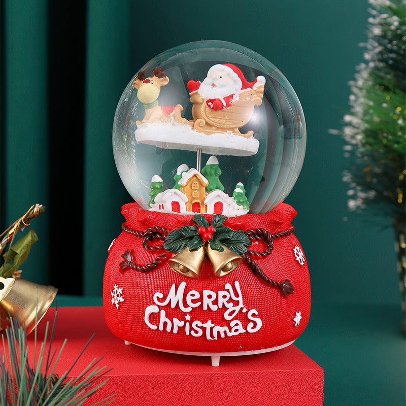 Weihnachtliche Schneekugel mit Musik und Licht