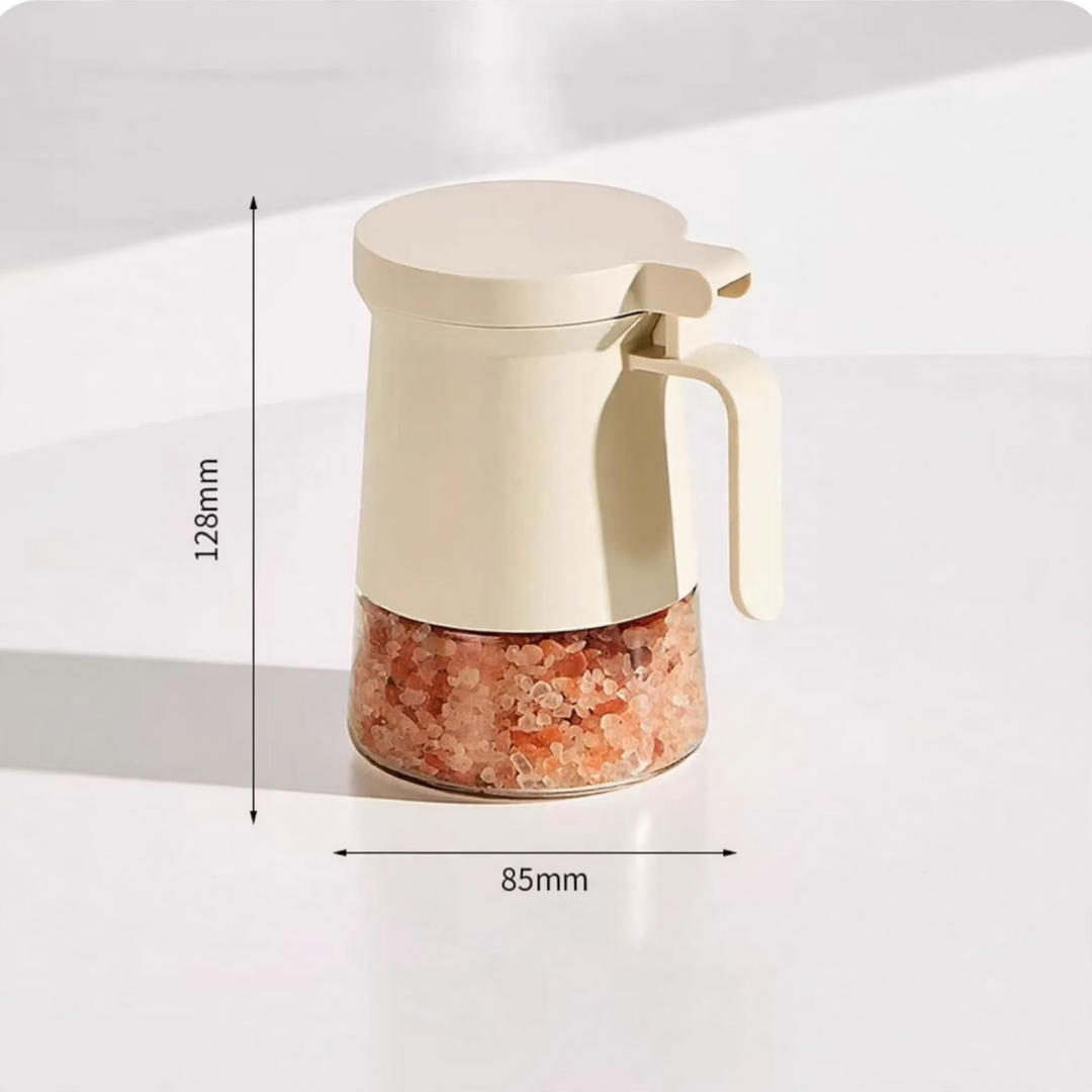 Versiegelter Gewürzbehälter aus Glas mit Löffel
