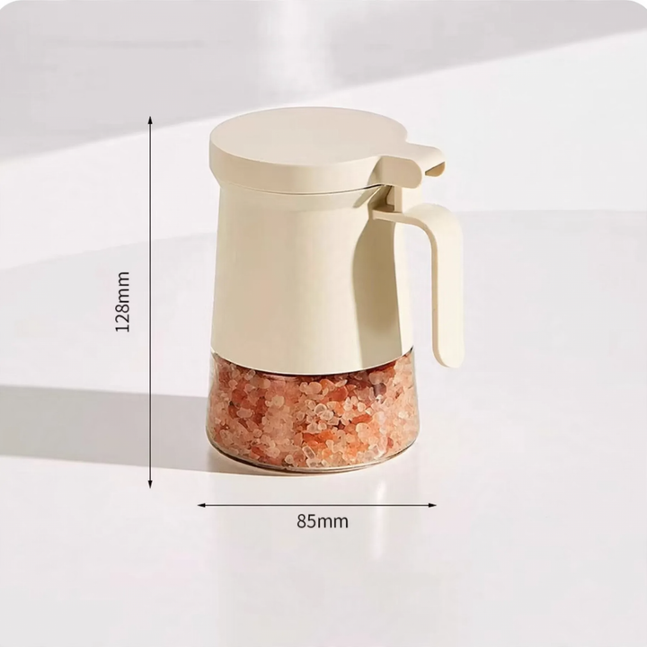Versiegelter Gewürzbehälter aus Glas mit Löffel