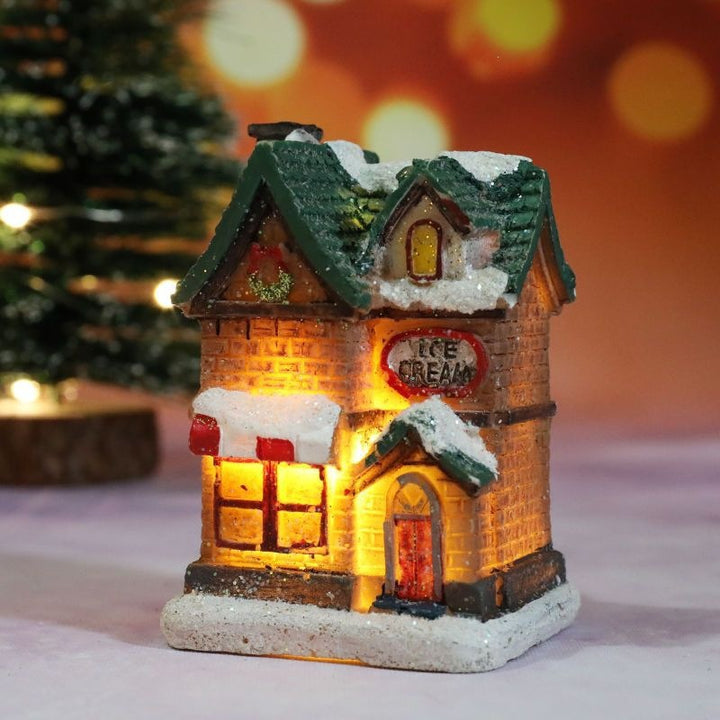 Beleuchtetes Weihnachtshaus aus Kunstharz