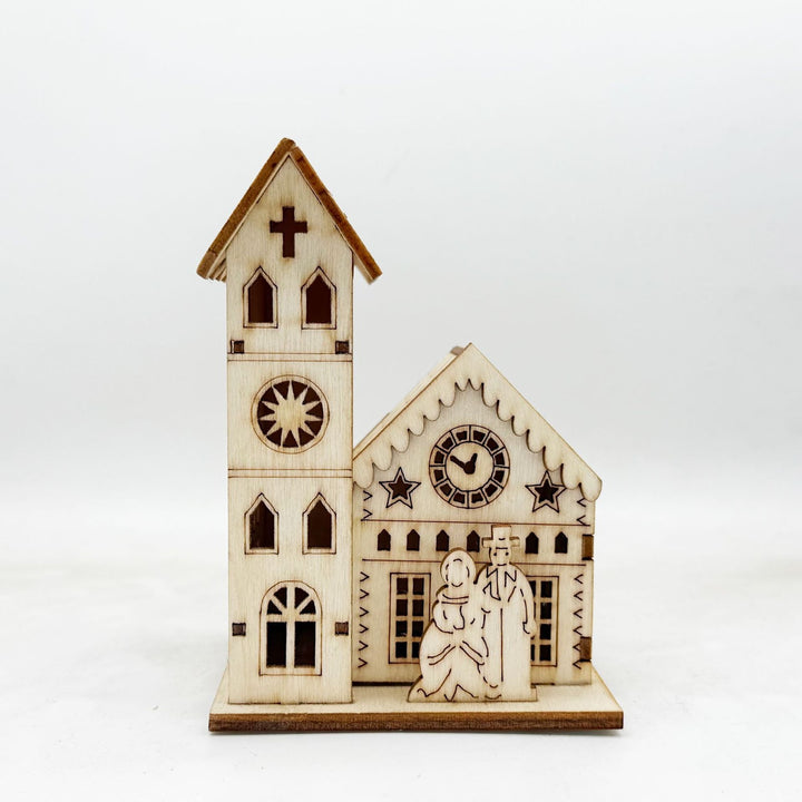 Beleuchtetes Holzhaus zur Weihnachtsdekoration