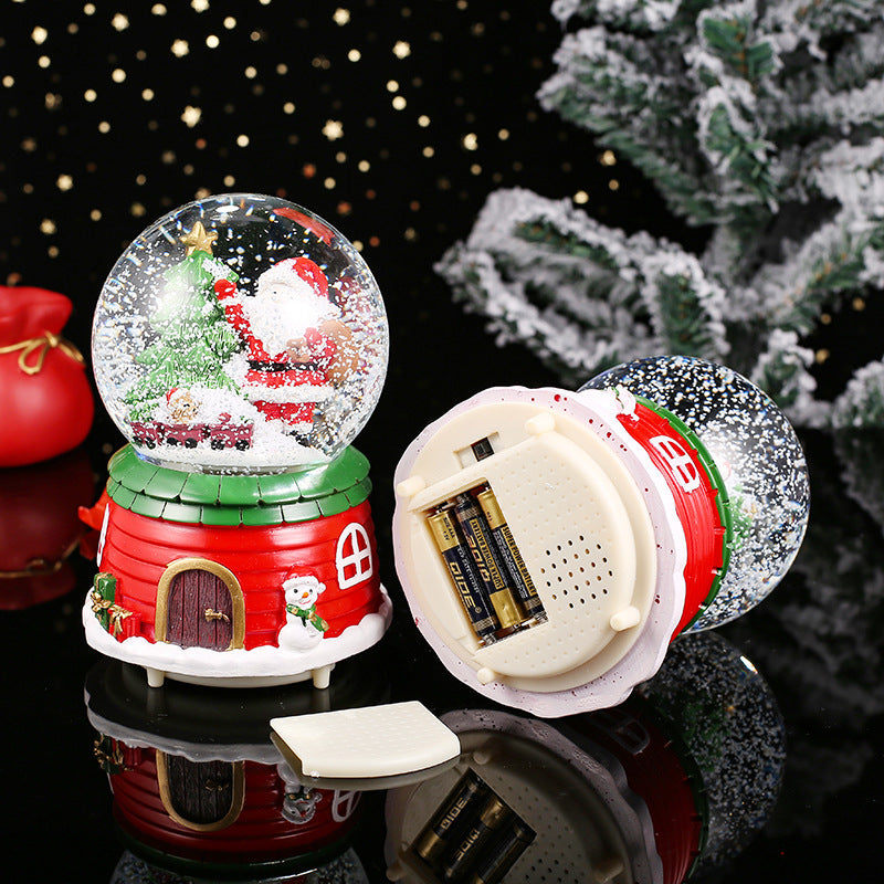 Weihnachtliche Schneekugel mit Musik und Licht
