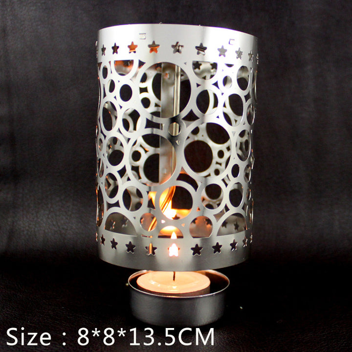 Rotierender Teelichthalter aus Messing, durchbrochenes Design