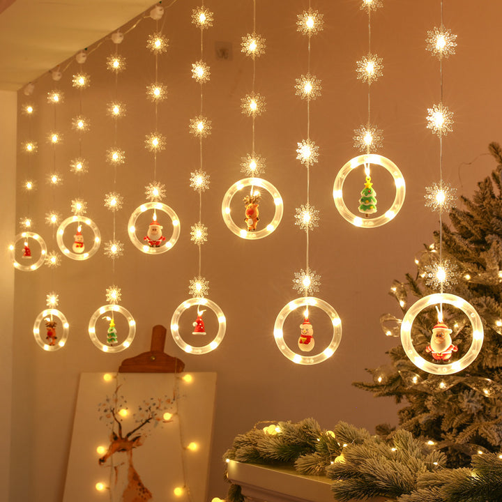 LED-Lichtervorhang mit weihnachtlichen Motiven