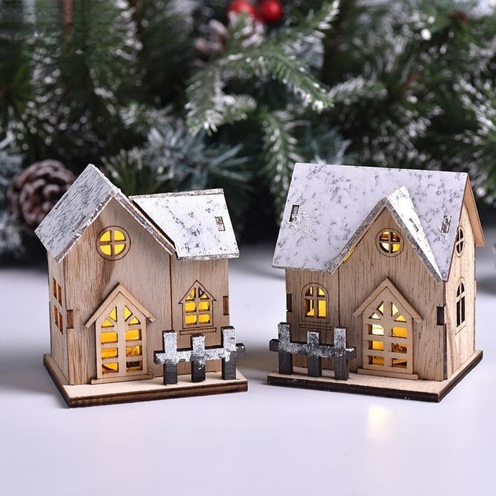 Beleuchtetes Holzhaus für die Weihnachtsdekoration