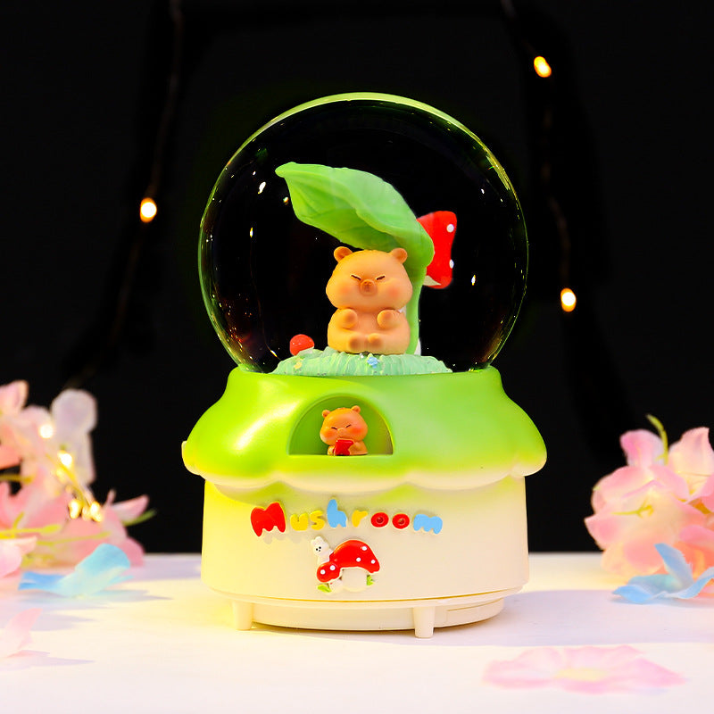 Märchenhafte Schneekugel mit Musik und Licht