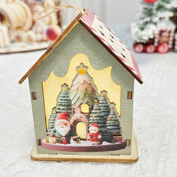 Beleuchtetes Weihnachts-Holzhaus im skandinavischen Stil