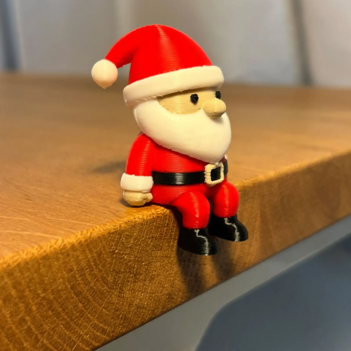Miniatur-Weihnachtsmann-Figur, sitzend