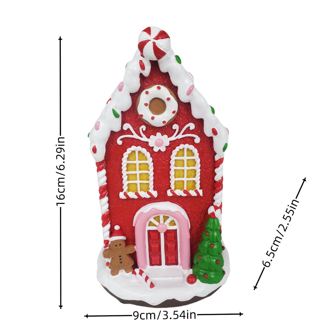 Dekoratives LED-Weihnachtshaus aus Kunstharz