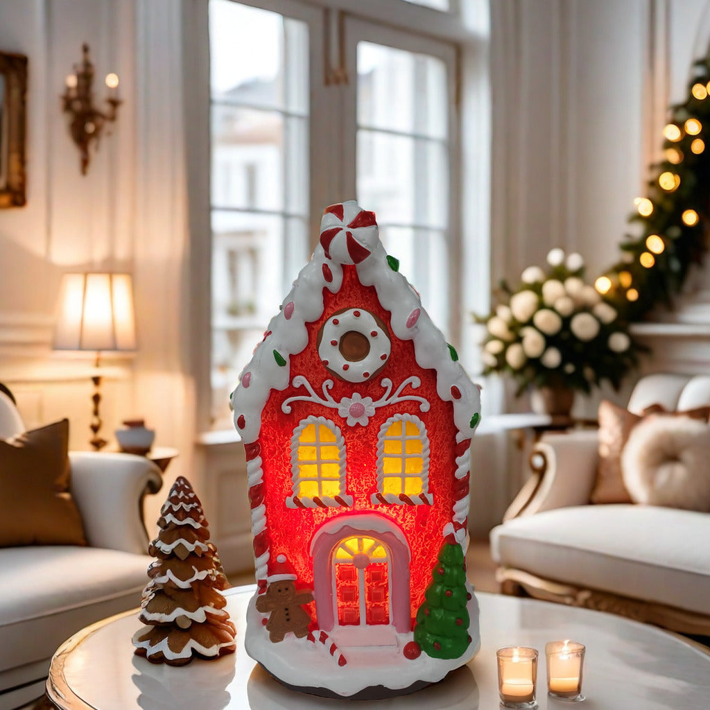 Dekoratives LED-Weihnachtshaus aus Kunstharz