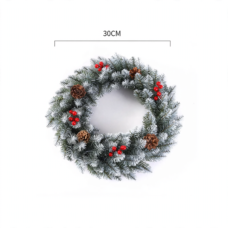 Weihnachtskranz mit Beeren und Tannenzapfen