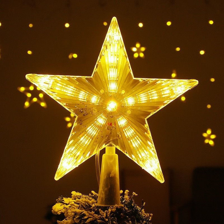 Beleuchteter Weihnachtsbaum-Spitzenstern mit Lichteffekten