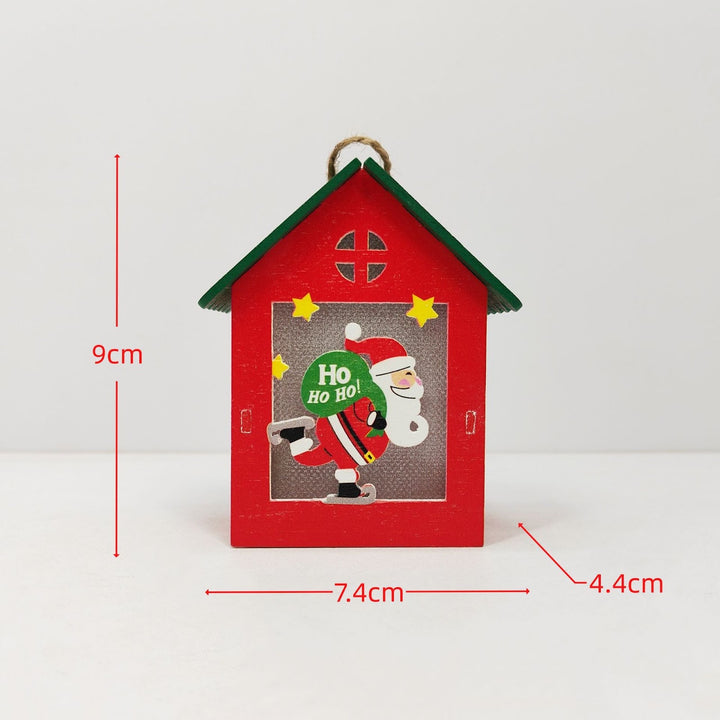 Beleuchtetes Holzhaus für die Weihnachtsdekoration
