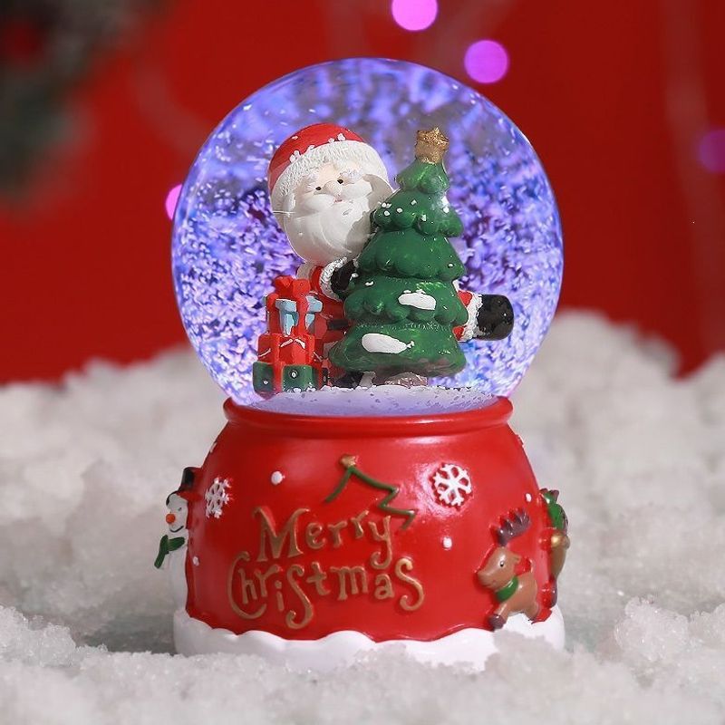 Weihnachtliche Schneekugel mit Musik und Licht