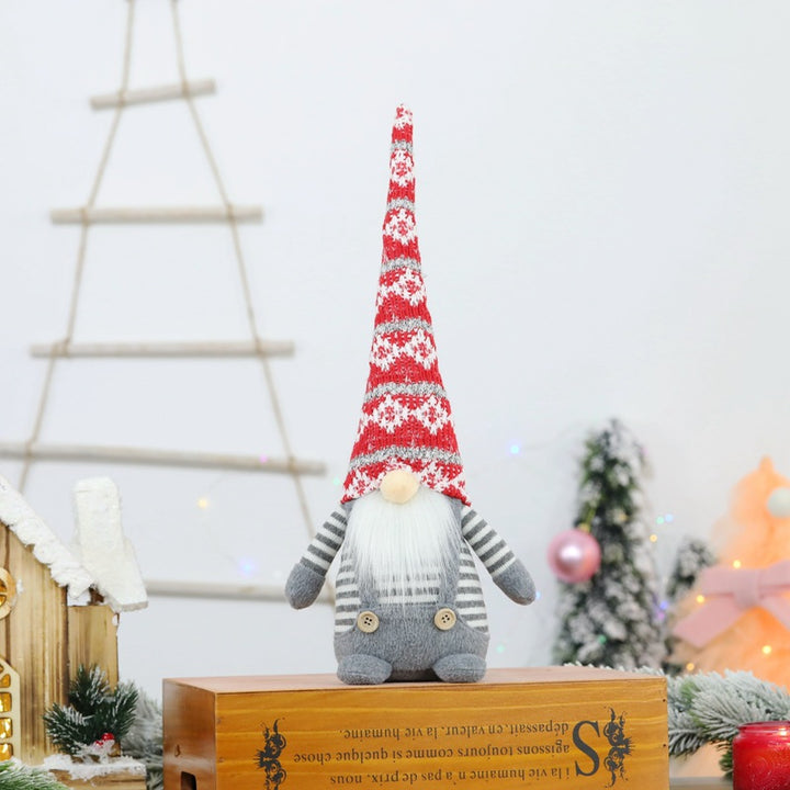 Weihnachts-Wichtelfigur mit Strickmütze, sitzend