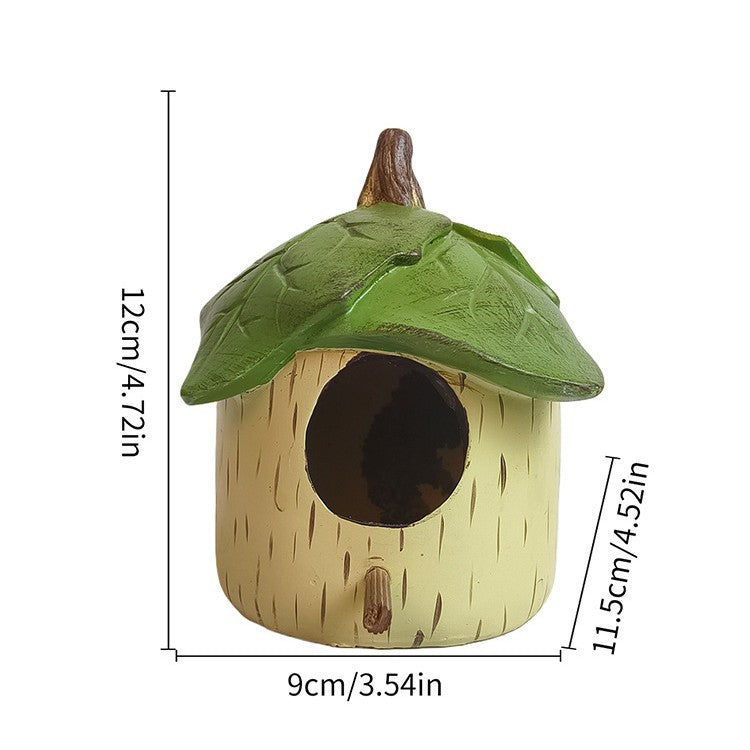Dekoratives Vogelhaus aus Kunstharz für den Garten
