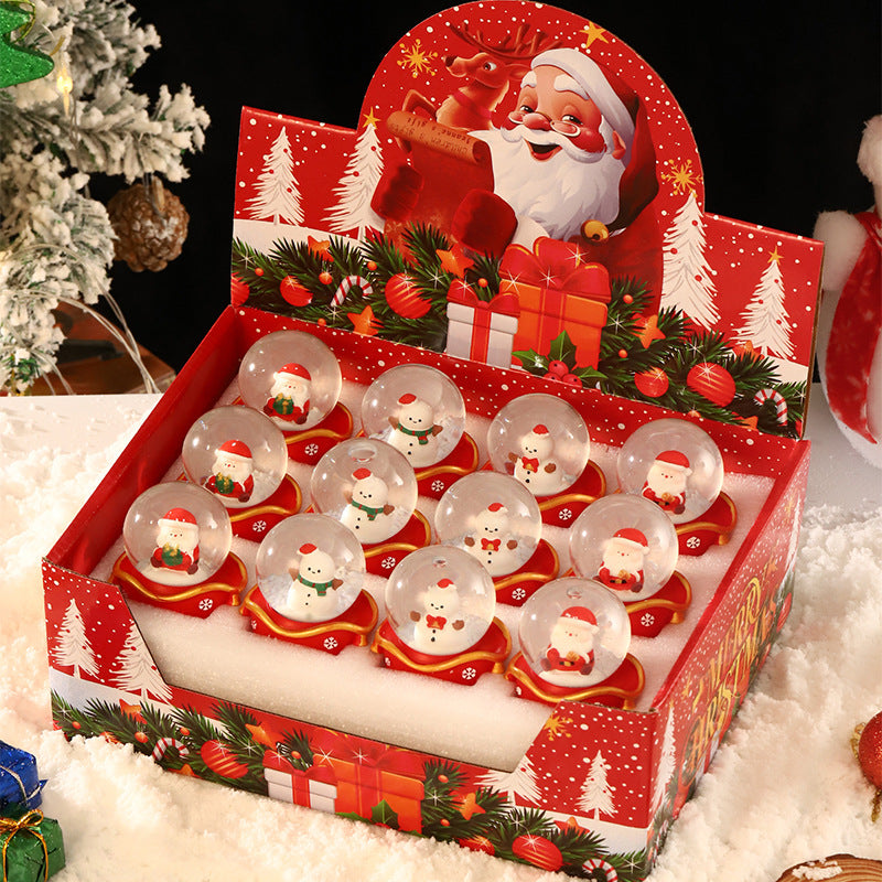 Leuchtende Weihnachts-Schneekugel mit Figuren