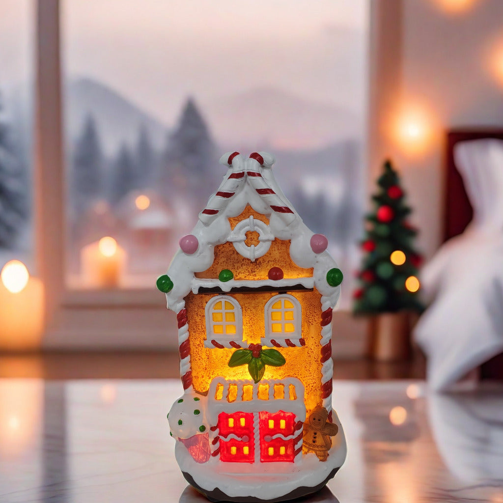 Dekoratives LED-Weihnachtshaus aus Kunstharz