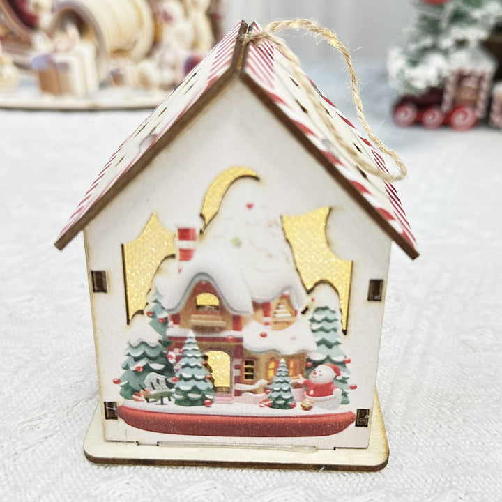 Beleuchtetes Weihnachts-Holzhaus im skandinavischen Stil