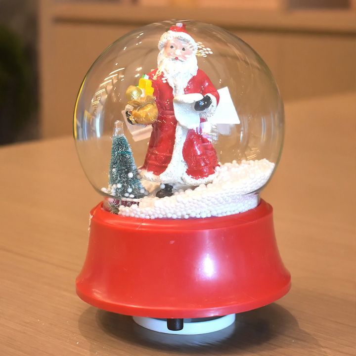 Weihnachtliche Spieluhr mit Schneekugel-Effekt