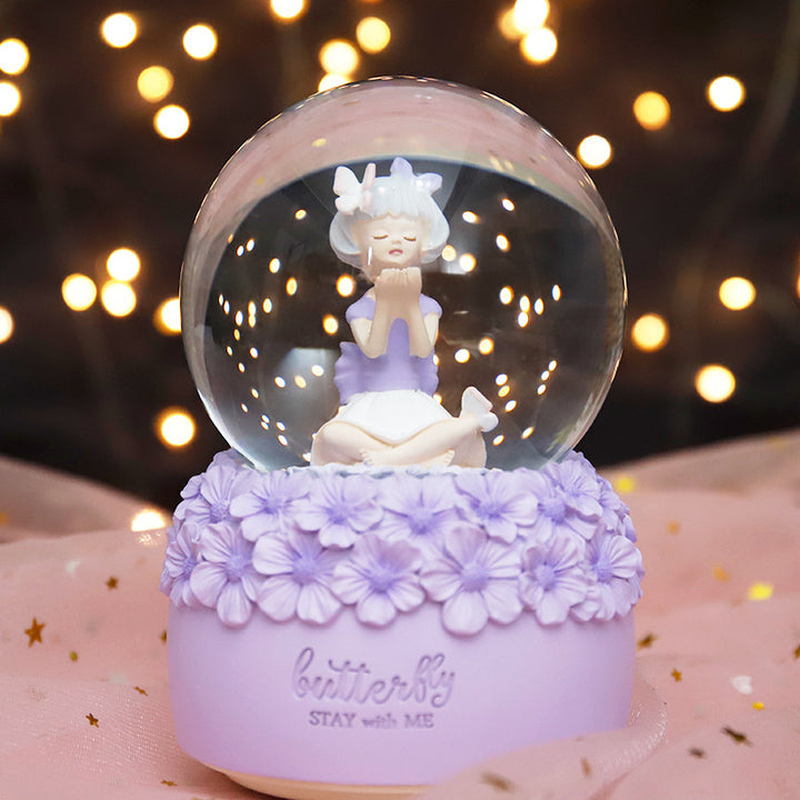 Spieluhr-Schneekugel mit Licht und Musik