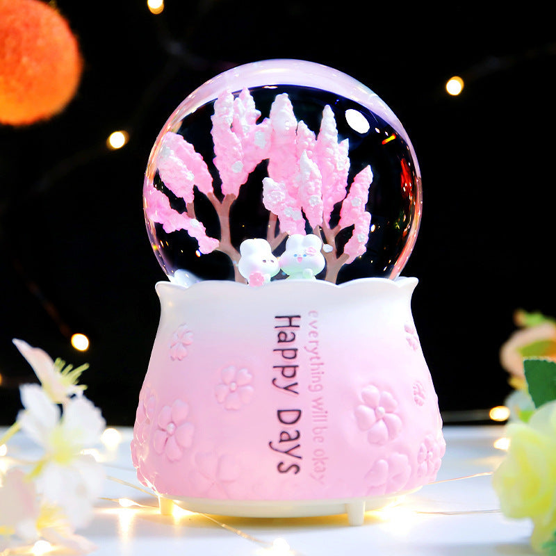 Spieluhr-Schneekugel mit Licht und Musik
