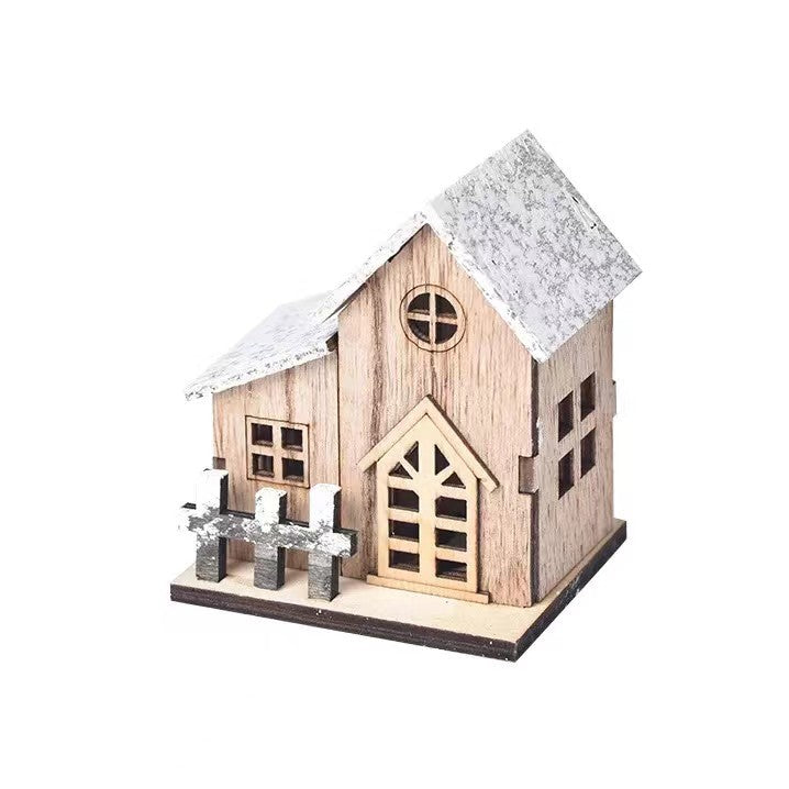 Beleuchtetes Weihnachts-Holzhaus im skandinavischen Stil