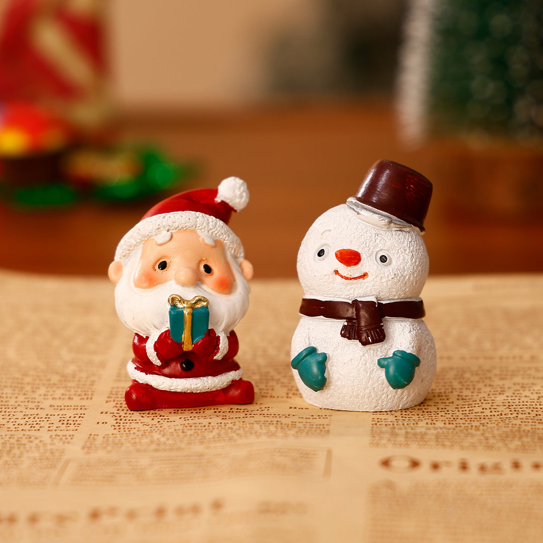 Dekorative Weihnachtsfiguren aus Kunstharz