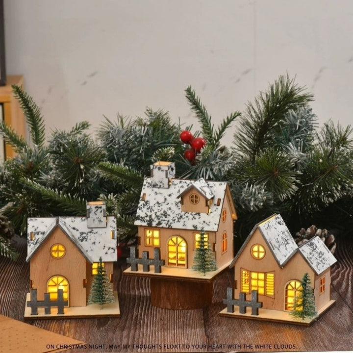 Beleuchtetes Holzhaus für die Weihnachtsdekoration
