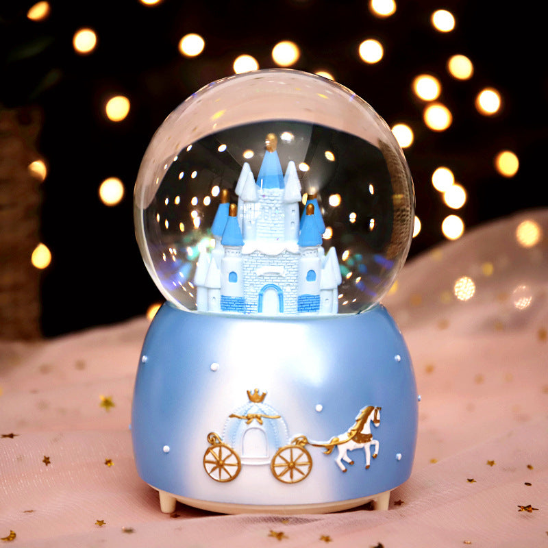 Märchenhafte Schneekugel mit Musik und Licht