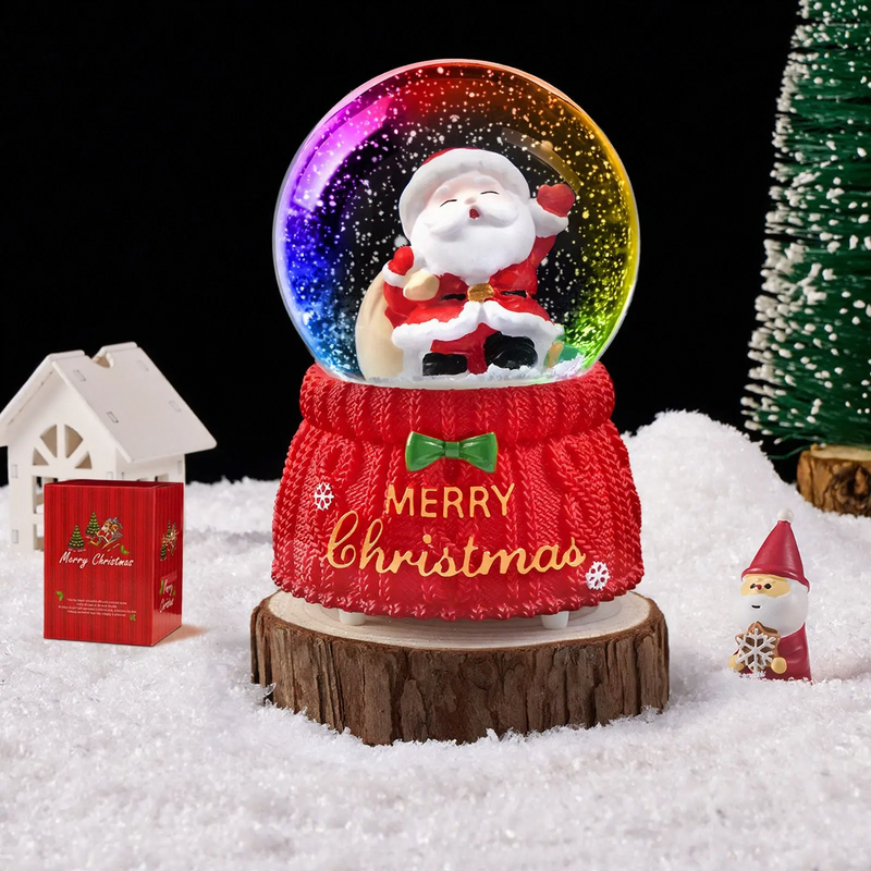 Weihnachtliche Schneekugel mit Spieluhr und Kutschen-Design