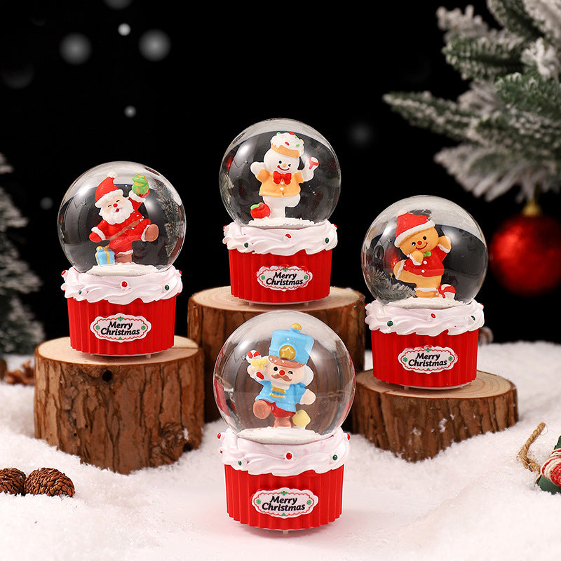 Leuchtende Schneekugel mit weihnachtlichen Motiven