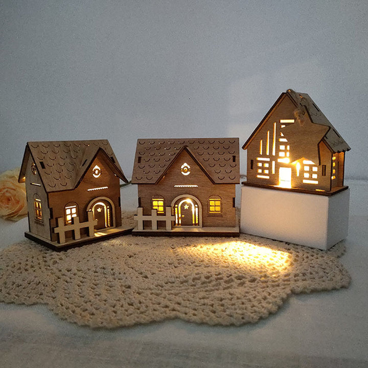 Beleuchtetes Holzhaus zur Weihnachtsdekoration
