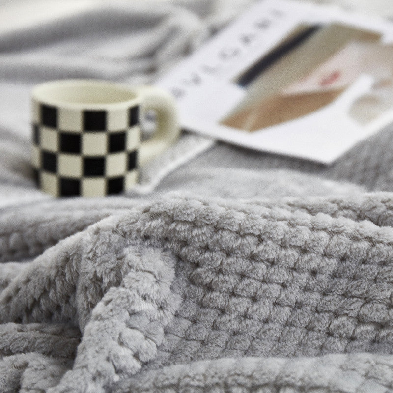 Flauschige Flanell-Decke mit Waffelstruktur