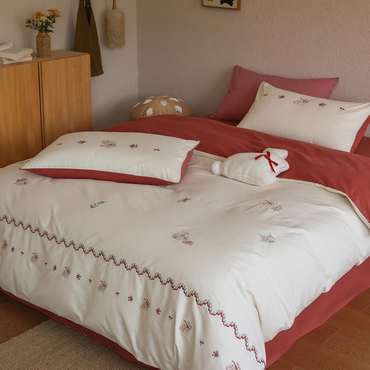 Elegantes Baumwoll-Bettwäscheset mit Stickerei und Schleifen