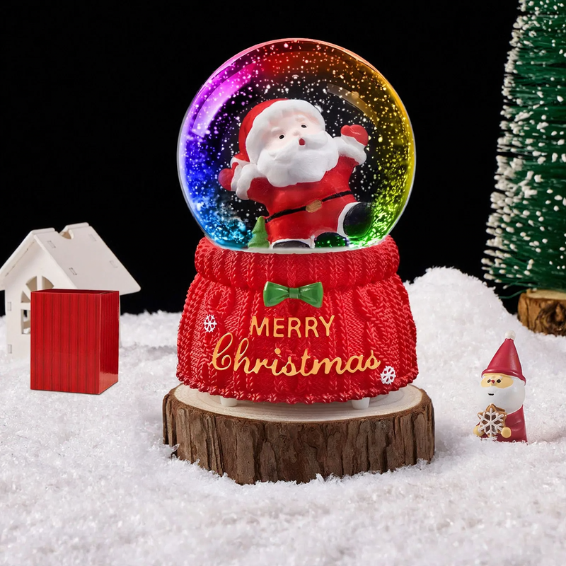 Weihnachtliche Schneekugel mit Spieluhr und Kutschen-Design