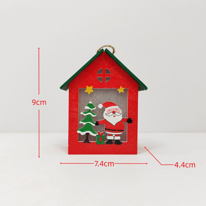Beleuchtetes Holzhaus für die Weihnachtsdekoration