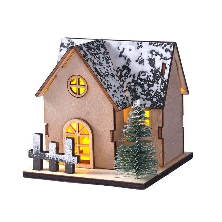 Beleuchtetes Holzhaus für die Weihnachtsdekoration